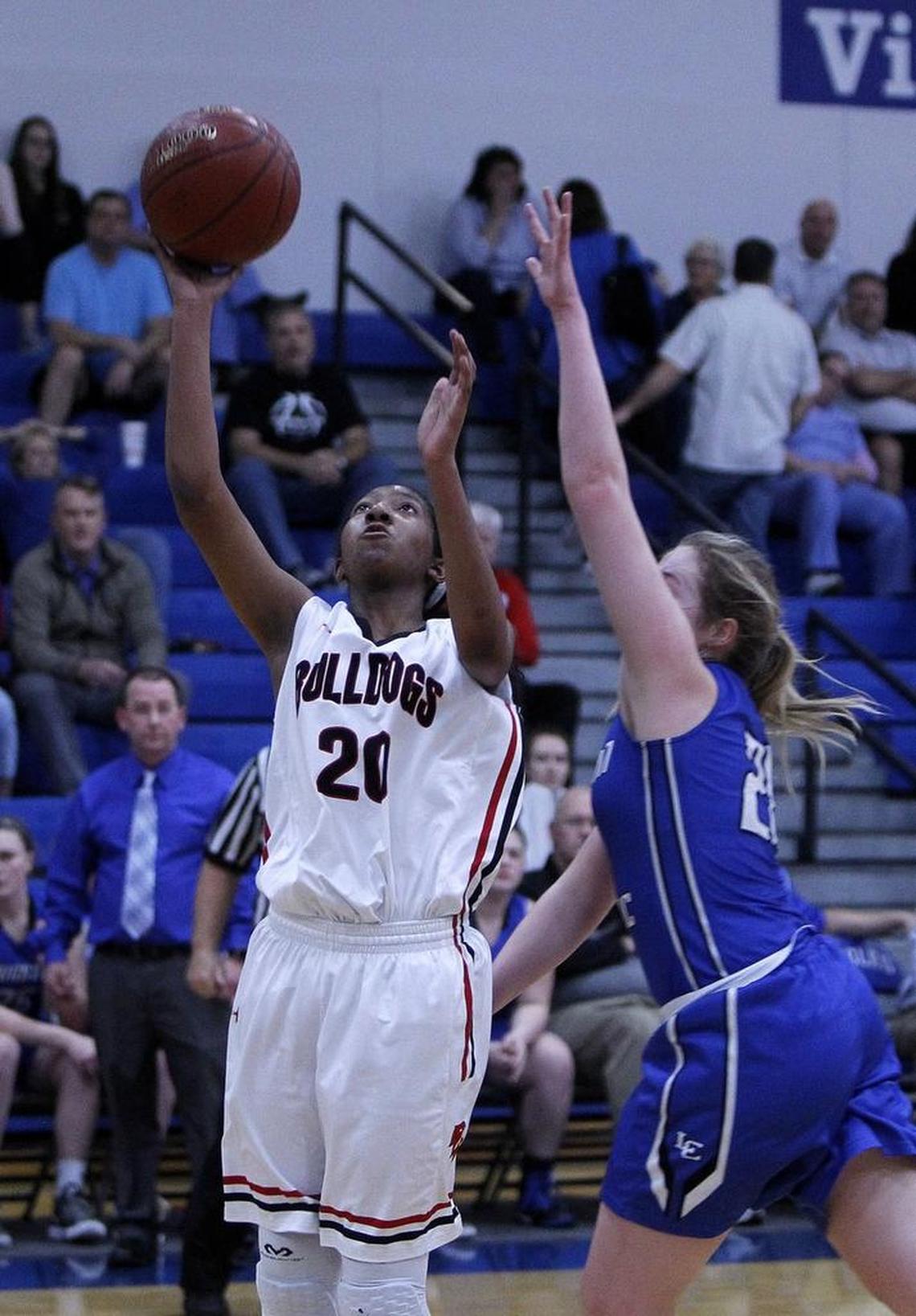 Paul Laurence Dunbar's Cheyenne Fullwood shot Tuesday evening against Lexington Catholic during the girls' 43rd district tournament at Lexington Christian.