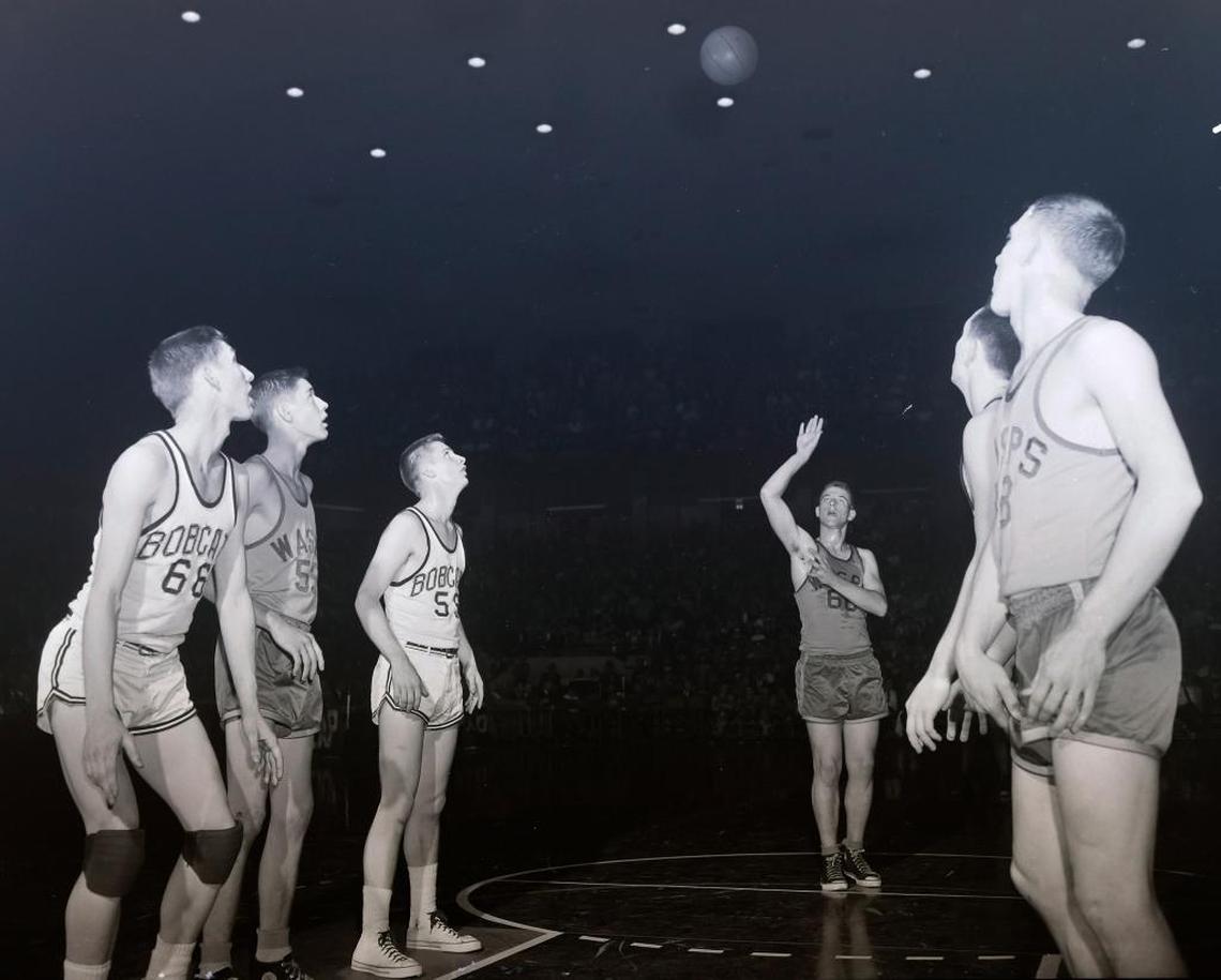 Bell County and Wayland players watched as Kelly Coleman’s free throw broke the state tournament scoring record in the third-place game of the 1956 event at Memorial Coliseum in Lexington. Coleman scored 68 points as Wayland beat Bell County 122-89 and finished the tournament with 185 points.