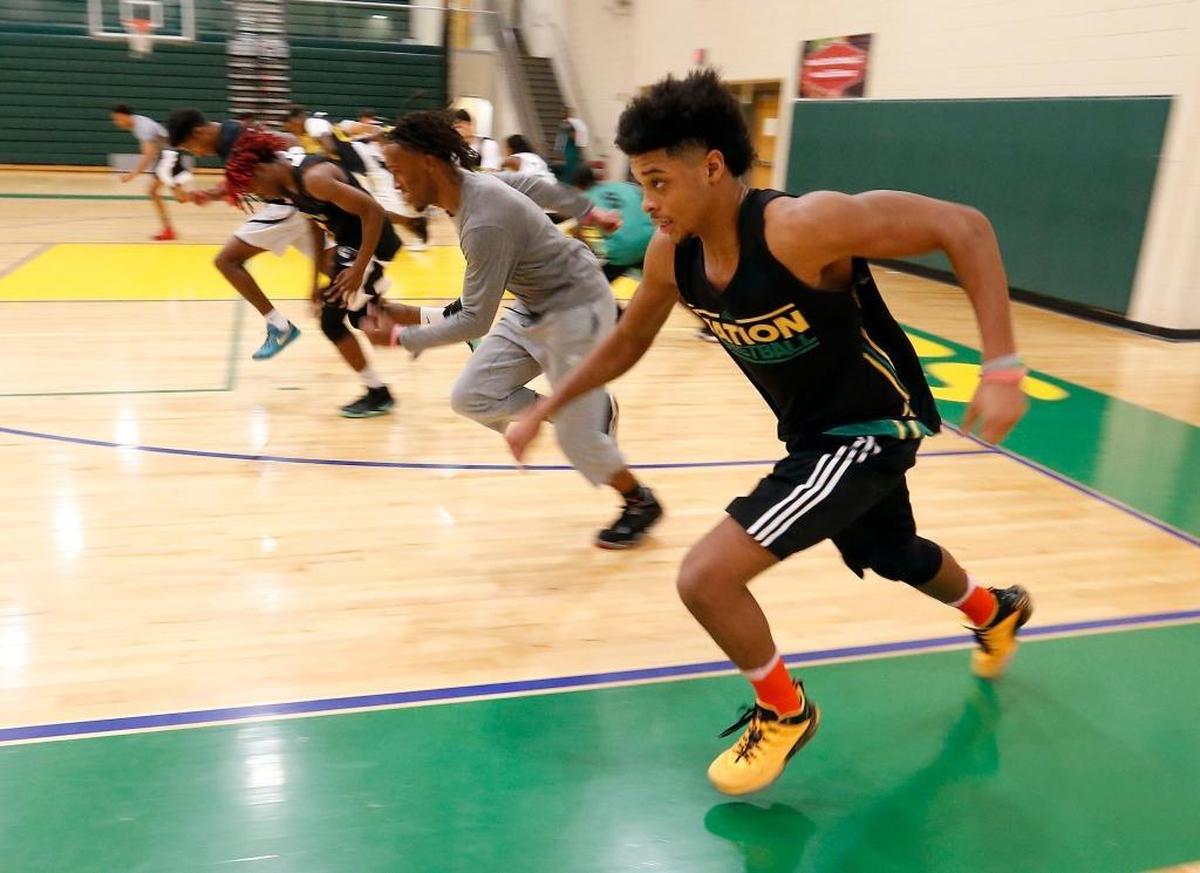 Jalen Burbage and teammates ran sprints as the Bryan Station High School boys' basketball team practiced in the school gymnasium in Lexington, Ky., Wednesday, December 20, 2017. Bryan Station boys' basketball is off to the best start in years, defeating four city teams and two ranked teams so far.