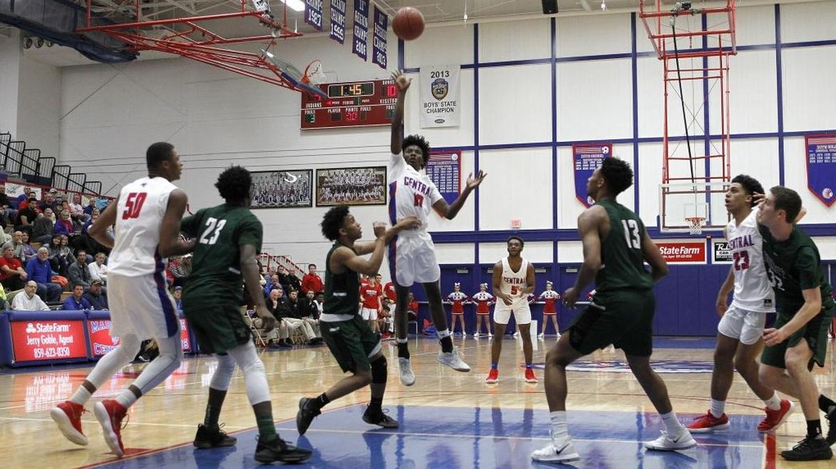 Madison Central's Jacori Miller shoots against Trinity at Madison Central gymnasium in Richmond, Ky., Friday, January 26, 2018.