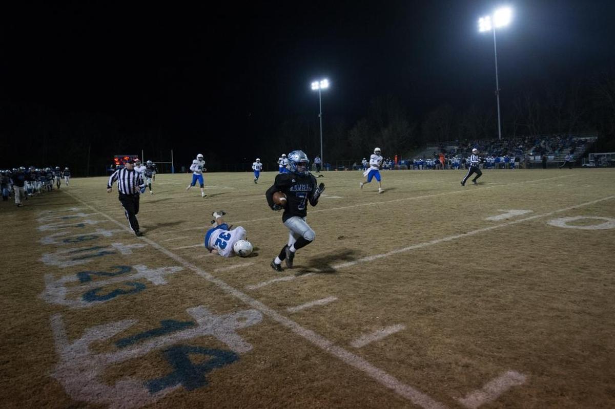 Danville's Dmauriae VanCleave (7) runs a pick 6 back as Lexington Christian's Dillon Wheatley (32) gave chase. Danville hosted Lexington Christian on Friday Nov. 17, 2017 in Danville, Ky.