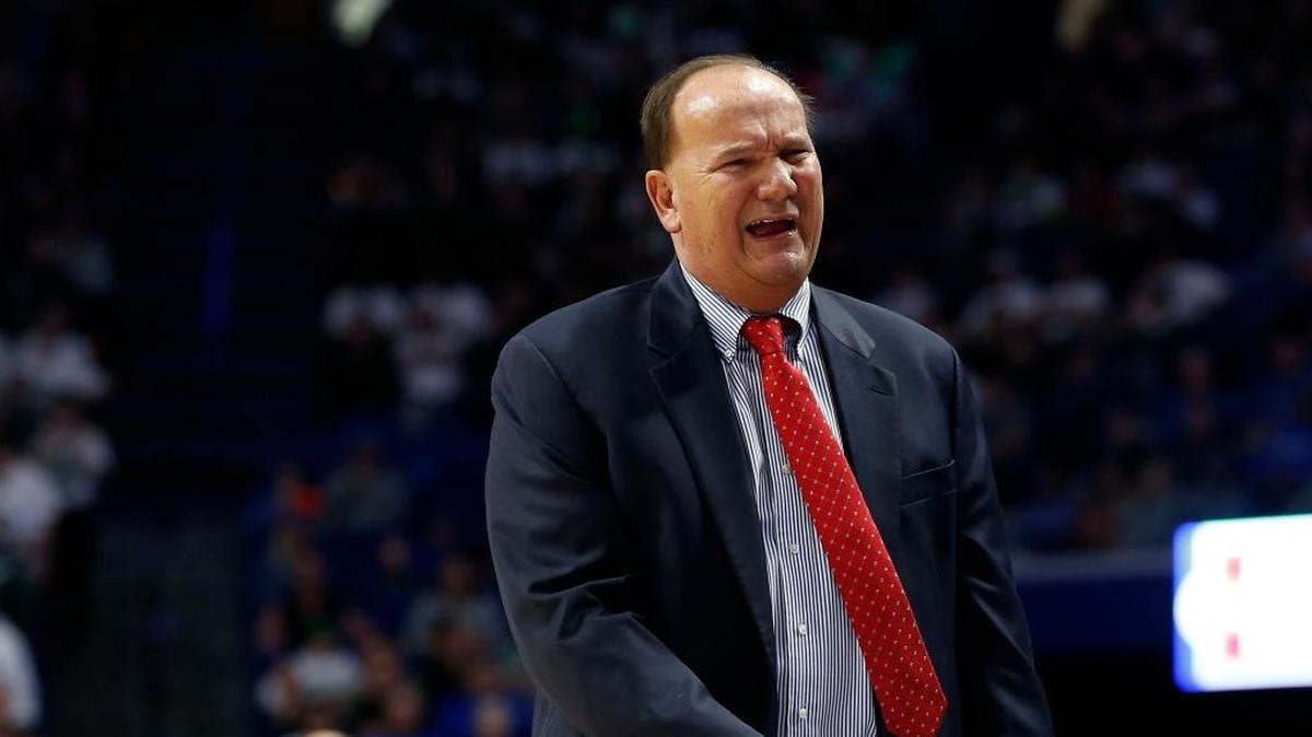 Scott County head coach Billy Hicks was upset with a call as Scott County played Trinity in an opening round game at the 101st Whitaker Bank/KHSAA Boys' Sweet Sixteen state basketball tournament being played Wednesday at Rupp Arena in Lexington. This is first quarter action.