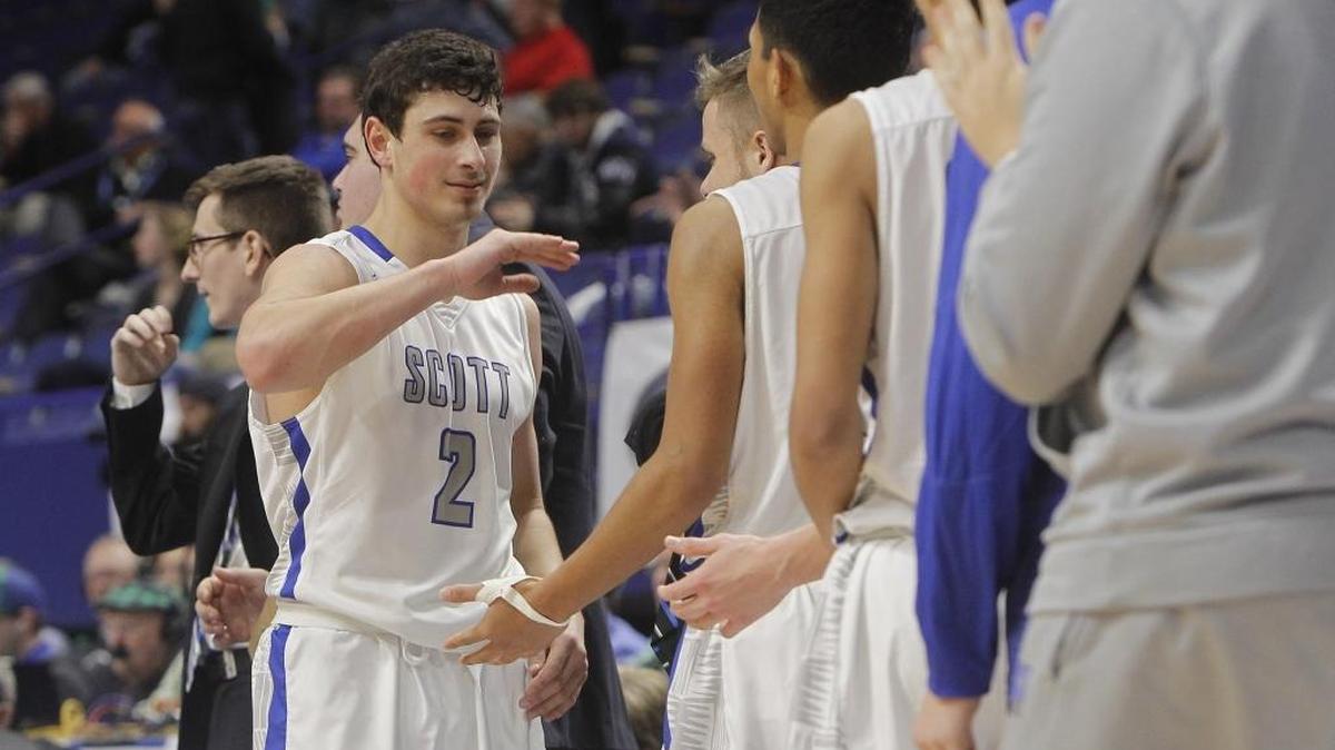 Scott's Jake Ohmer slaps hands as he exits the game after scoring 32 points against Perry Co. Central during the quarterfinals of the Whitaker Bank/KHSAA Boys' Sweet 16 at Rupp Arena in Lexington, Ky., Friday, March 17, 2017.
