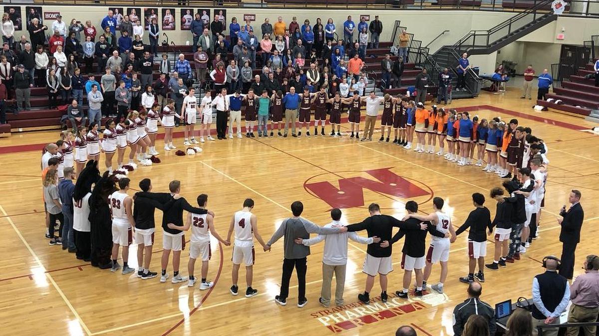 McCracken County and Carlisle County athletes and students formed a prayer circle before their boys’ basketball game Tuesday night.