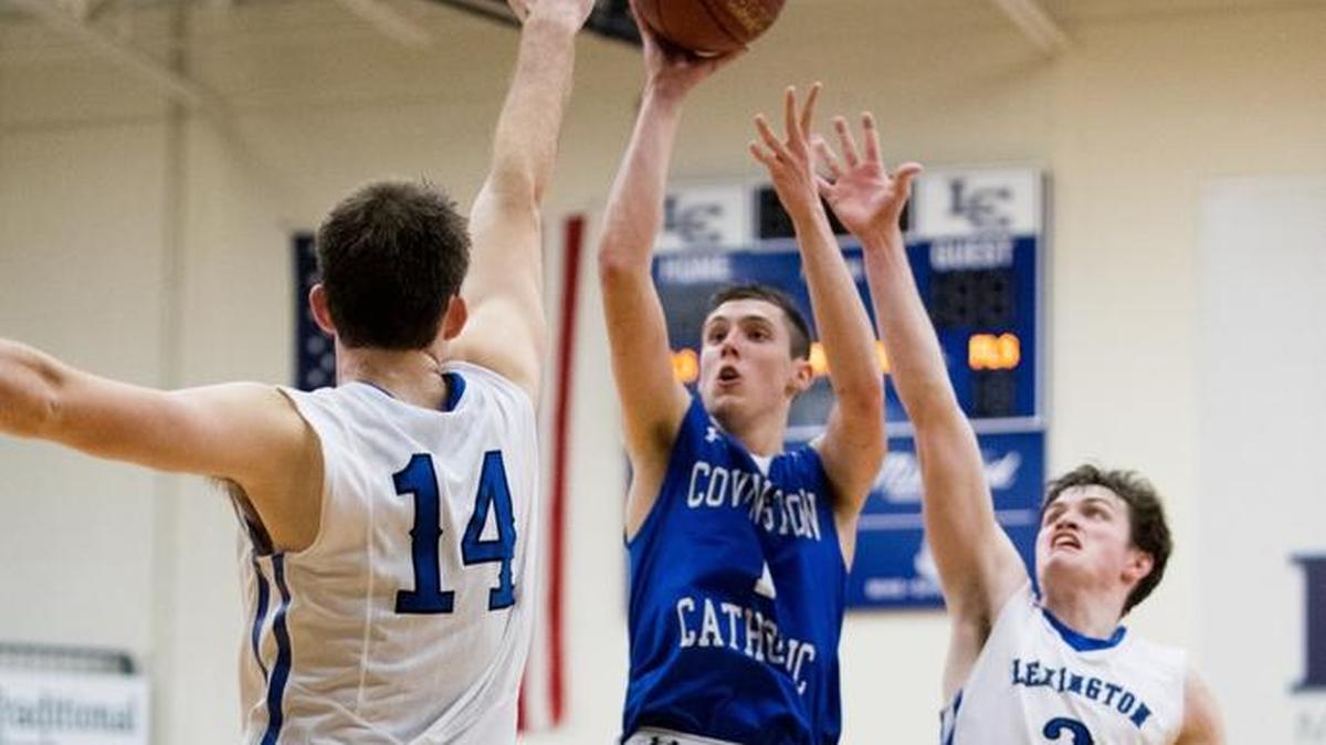 CJ Fredrick (1) leads Covington Catholic in scoring at 22.5 points per game. The 6-foot-4 senior will play college ball at Iowa.