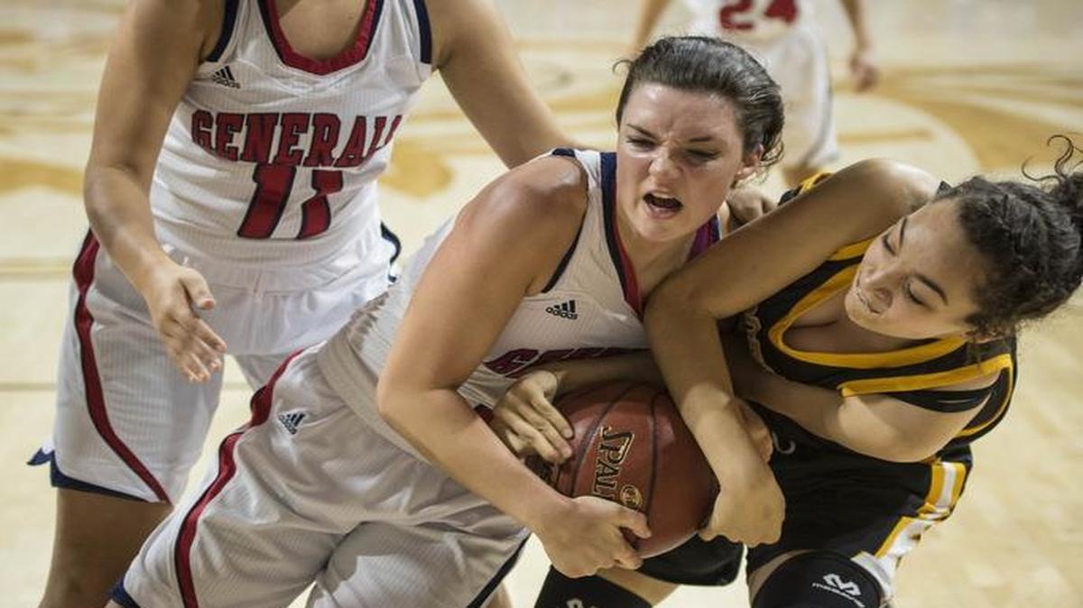 Lafayette's Caroline Bennett (5) fights for a rebound with Woodford County's Devan Champion (34), during the girls’ 11th Region Tournament, Monday, February 27, 2017, at EKU's McBrayer Arena in Richmond.