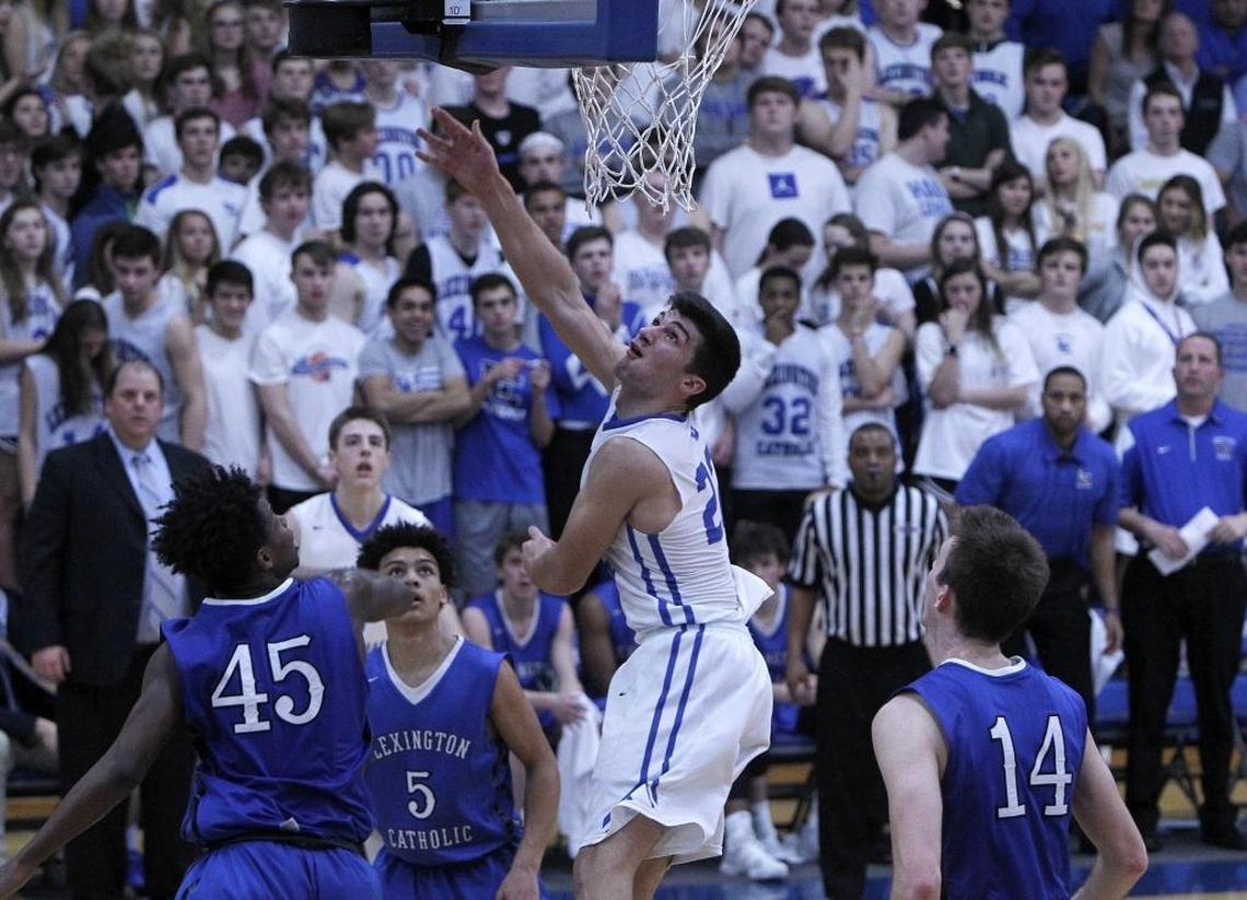 Lexington Christian's Kyle Rode shot Tuesday evening against Lexington Catholic during the boys' 43rd district tournament at Lexington Christian. Lexington Christian prevailed 53-52 to earn a return trip to the 11th region tournament.