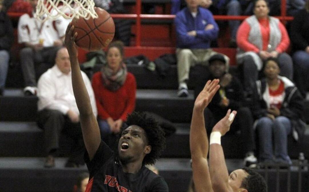 Paul Laurence Dunbar's Taveion Hollingsworth shot against West Jessamine’s Skyler Cannady on Feb. 14.