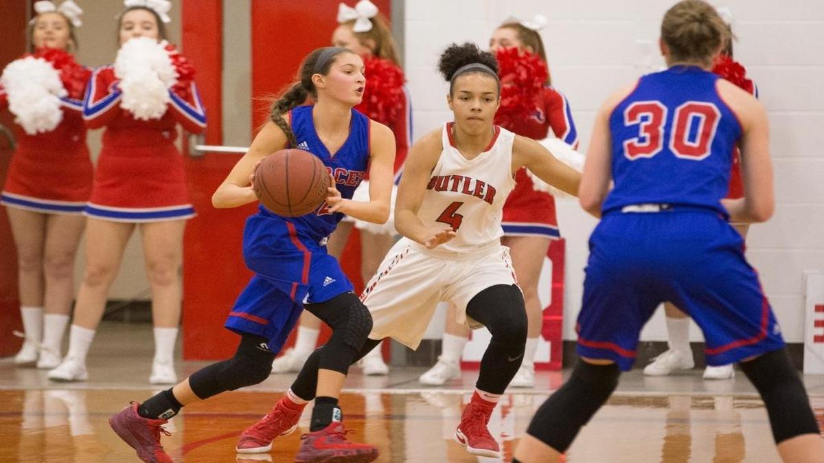 Mercer County guard Lexy Lake (12) dribbled the ball against Butler’s Fontasia Jeffries (4).