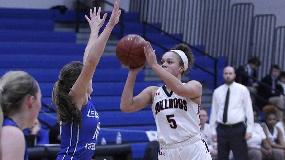 Paul Laurence Dunbar’s Elise Ellison-Coons shot Tuesday evening against Lexington Catholic during the girls’ 43rd district tournament at Lexington Christian last year.