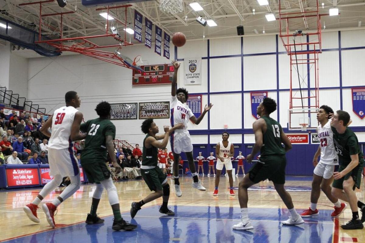 Madison Central's Jacori Miller shoots against Trinity at Madison Central gymnasium in Richmond, Ky., Friday, Jan. 26, 2018.