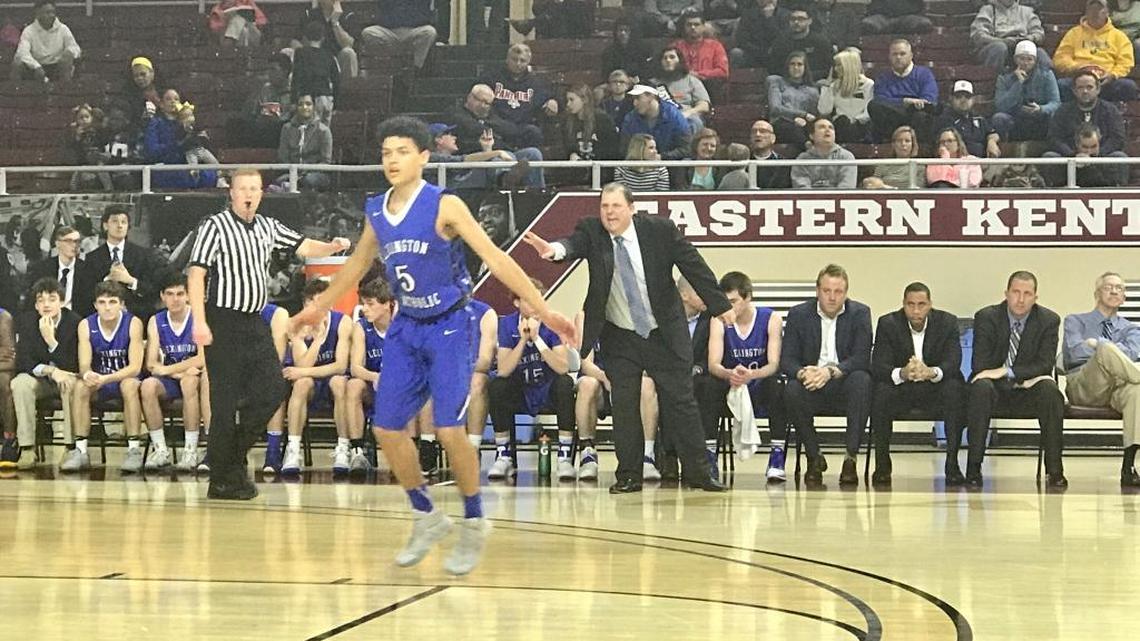 Lexington Catholic Coach Brandon Salsman and the Knights’ Keegan Bailey reacted after LexCath scored in the second half.
