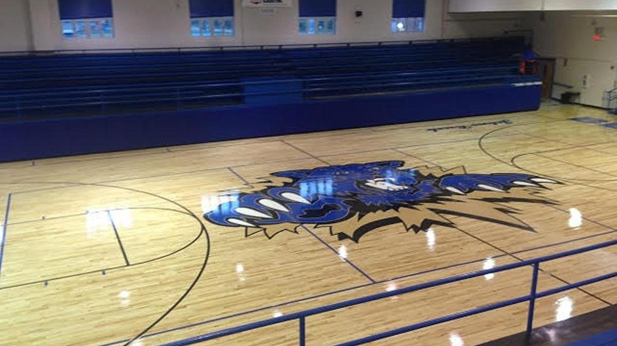 Johns Creek Elementary, which formerly was a high school, will host a boys’ varsity basketball game between Pike County Central and Phelps on Saturday, Jan. 21, 2017. Johns Creek High School and Mullins High School consolidated into Pike County Central after the 1992-93 school year. This is the gym floor, which was replaced two years ago.
