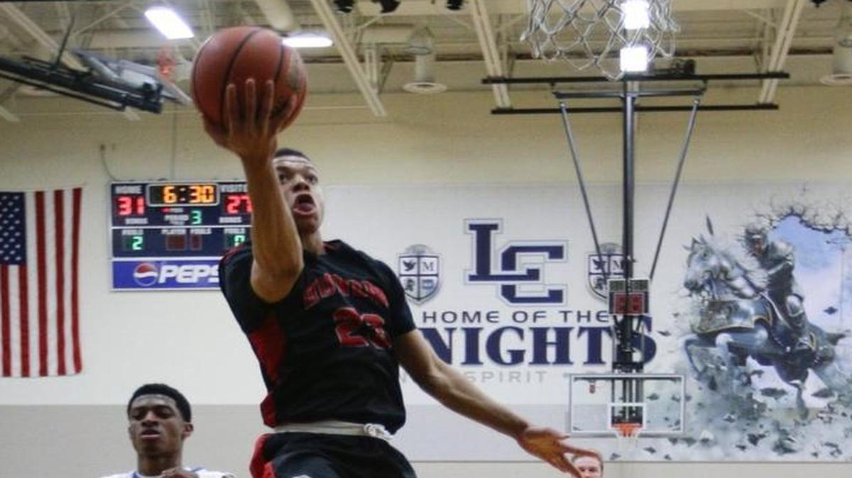 Dunbar's Darius Williams put in two of his 31 points as Dunbar defeated Lexington Catholic 63-62 on on Friday December 11, 2015 in Lexington, Ky.
