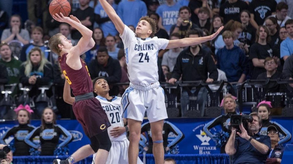 Collins’ Charlie Cochran defender Cooper junior Adam Kunkel during the quarterfinals of the 100th Whitaker Bank/KHSAA Boys’ Sweet Sixteen on Friday, March 17, 2017.