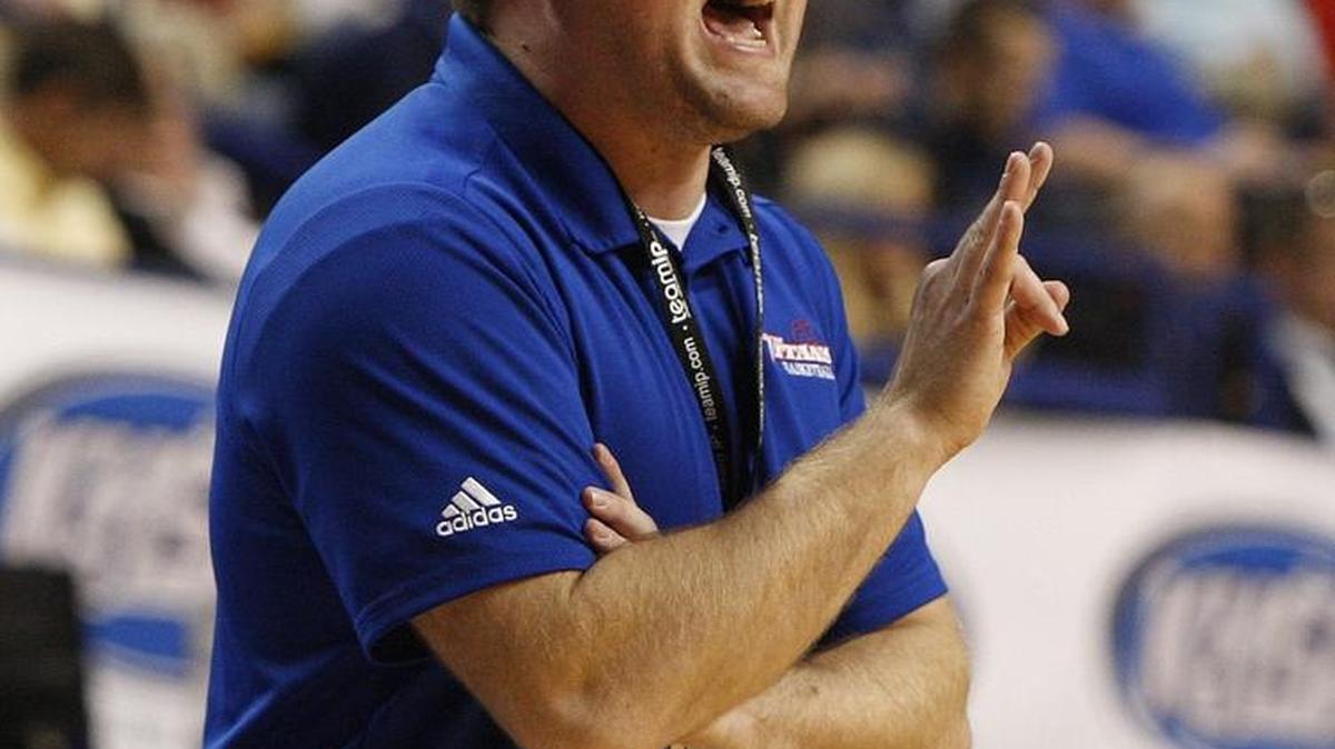 Mercer Co. Coach Josh Cook during the Titans’ game against Paul Laurence Dunbar in the Whitaker Bank/KHSAA Sweet 16 state basketball championship in Lexington, Ky., Wednesday, March 16, 2016.