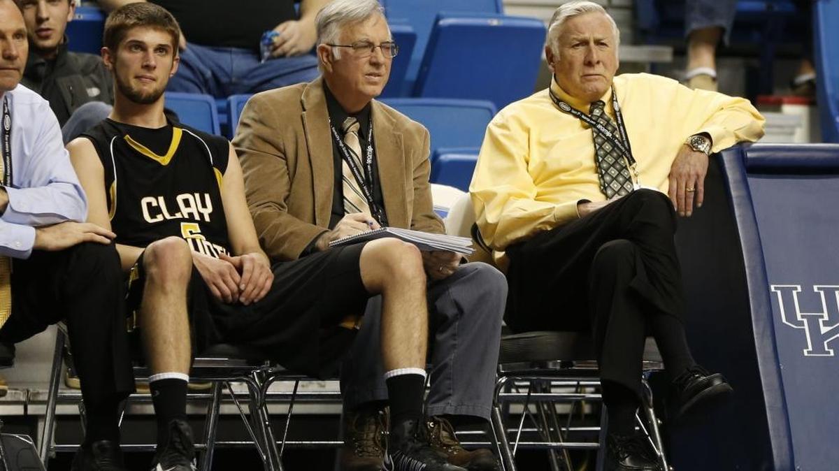 Former Clay County coach Bobby Keith, far right, sat on the bench as an honorary coach as Knott County played Clay County in Lexington in 2013