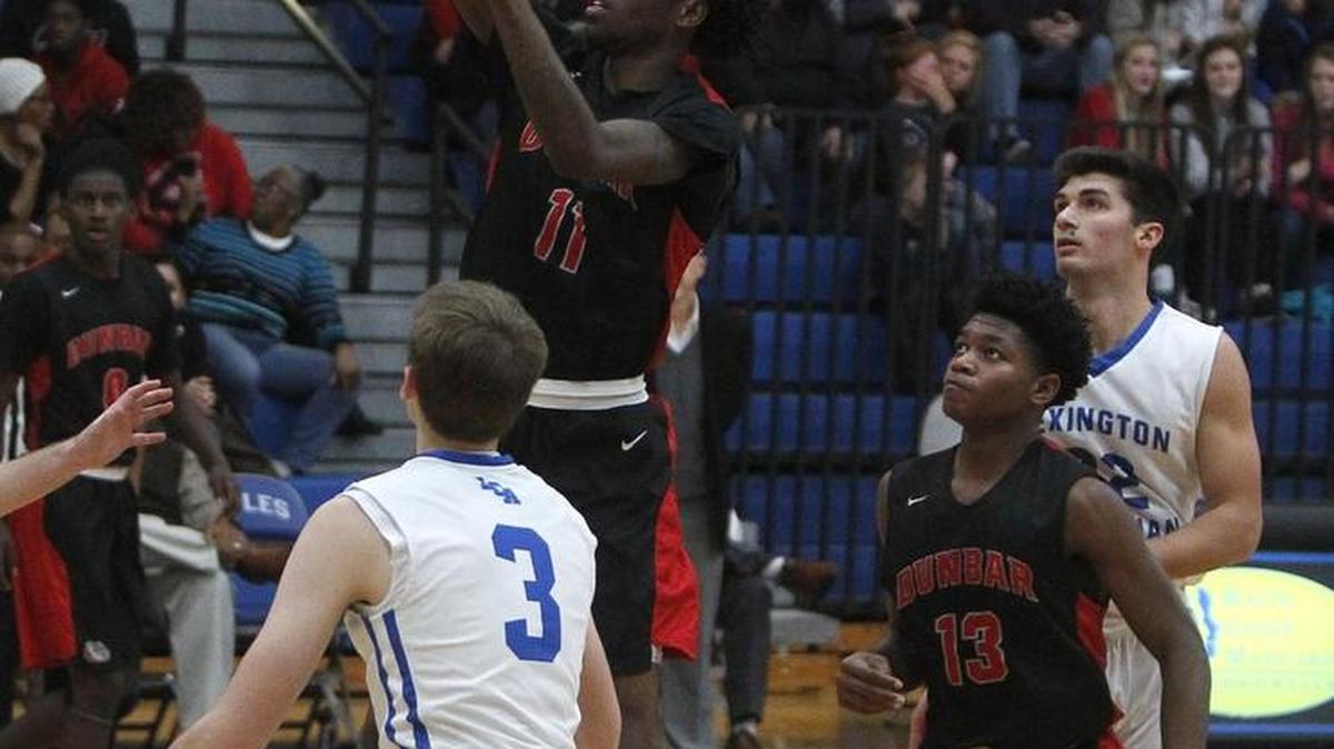Paul Laurence Dunbar's Taveion Hollingsworth, who scored 40, shoots against Lexington Christian at Lexington Christian Academy in Lexington, Ky., Friday, January 6, 2017.