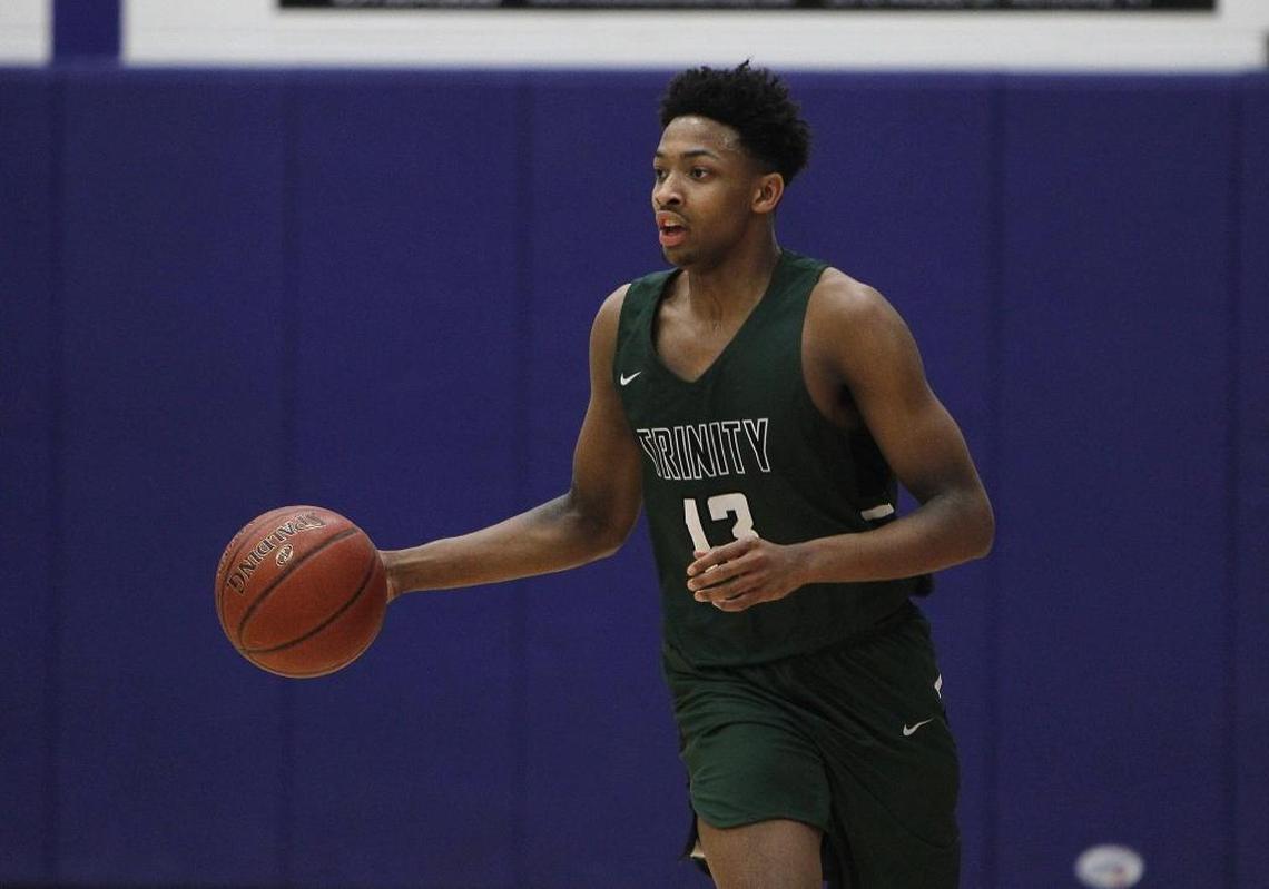 Trinity's David Johnson runs the point against Madison Central at Madison Central gymnasium in Richmond, Ky., Friday, January 26, 2018.