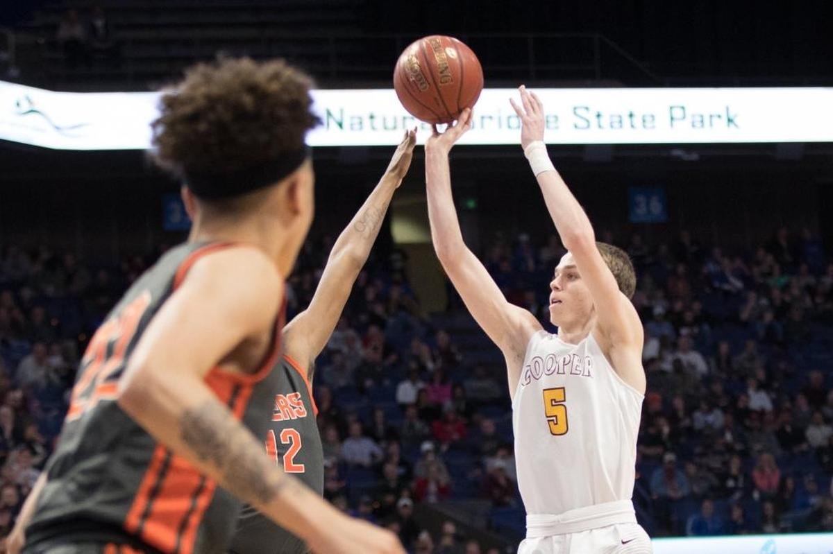 Cooper's Adam Kunkel (5) shot a jumper as Cooper played Fern Creek in the semifinals of the Whitaker Bank/KHSAA Boys' Sweet 16 at Rupp Arena on Saturday March 18, 2017 in Lexington, Ky.