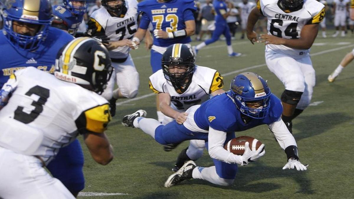 Henry Clay's Tyree Clark dives for extra yards against Johnson Central at Henry Clay in Lexington, Ky., Thursday, August 31, 2017.