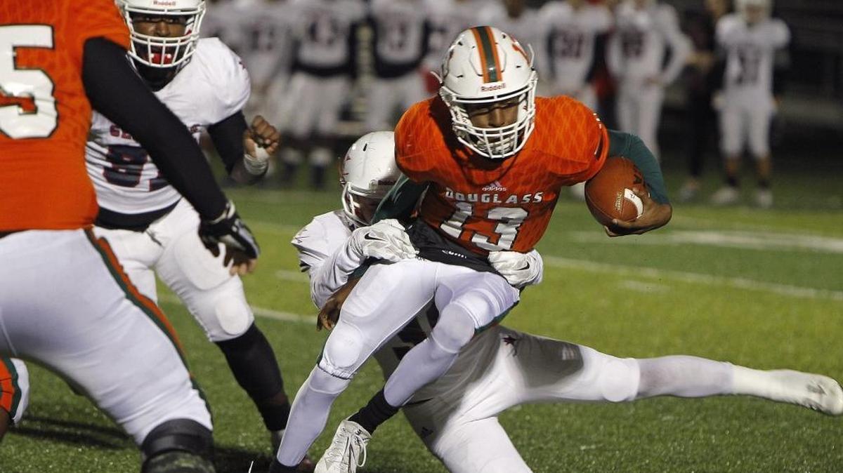 Frederick Douglass’s Montaveon Bean was sacked by Lafayette's Kyle Browning on Friday night. Bean left the game in the first half with a knee injury. Douglass will have a rematch with Tates Creek in the second round of the playoffs.