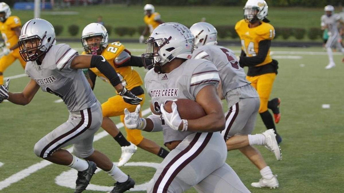 Tates Creek's Teonte White runs against Bryan Station at Tates Creek in Lexington, Ky., Friday, September 15, 2017.
