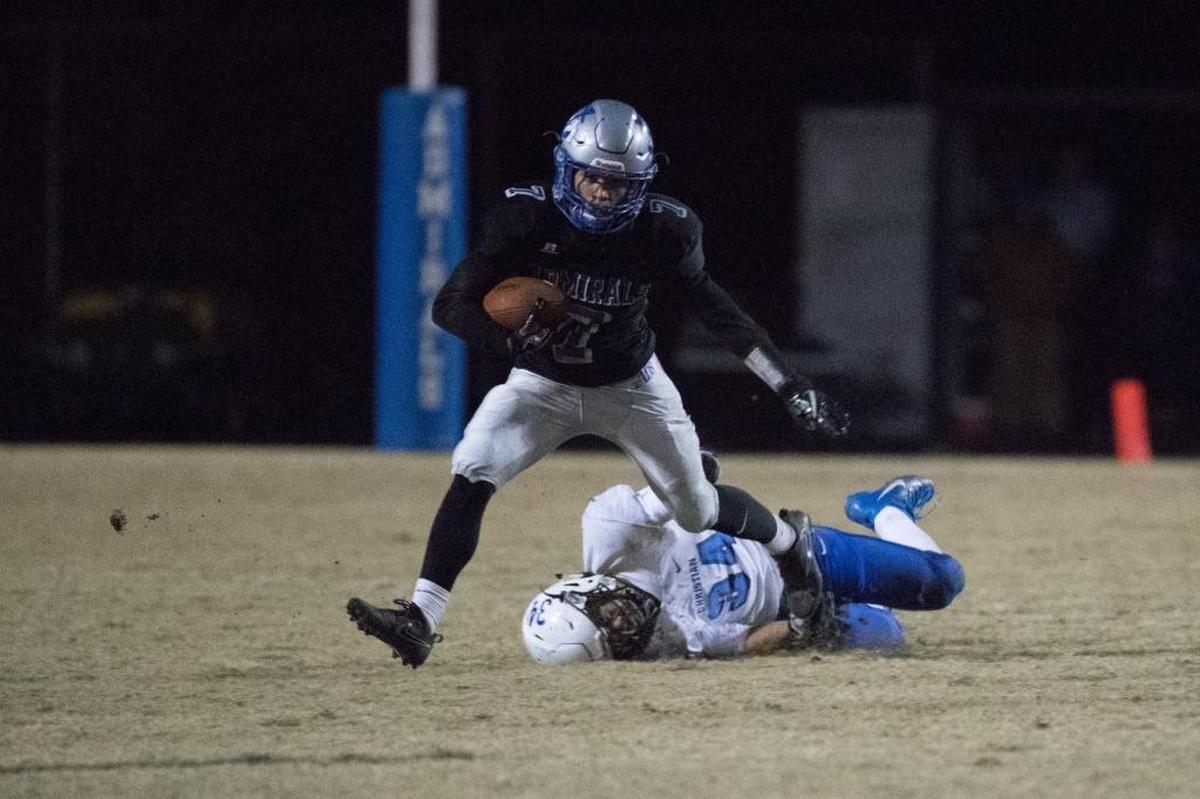 Danville's D’Mauriae VanCleave (7) ran by Lexington Christian's Jonathan Kaufmann (34) as Danville hosted Lexington Christian on Friday Nov. 17, 2017 in Danville, Ky.