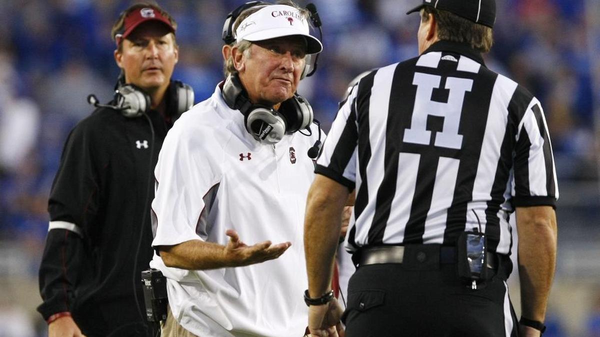 South Carolina Gamecocks head coach Steve Spurrier talks with a referee during a timeout in the first half at Commonwealth Stadium Sept. 29, 2012 in Lexington, Ky.