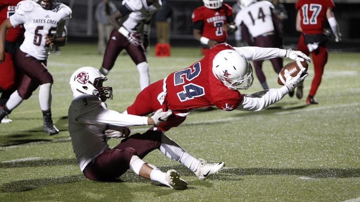 Lafayette's Cameron Morgan falls inches short of a touchdown on a long run against Tates Creek in the second round of football playoffs at Ishmael Stadium in Lexington, Ky., Friday, November 11, 2016.