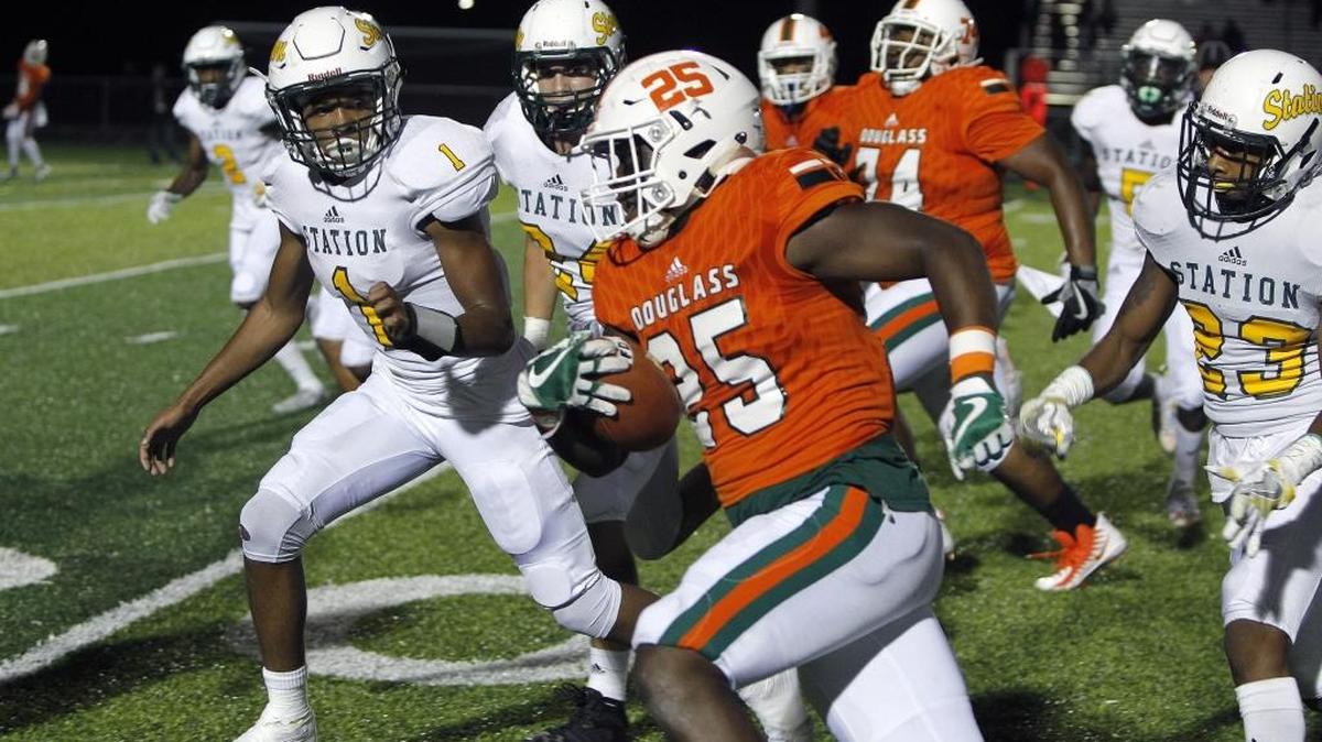Frederick Douglass' Jefferson Harkless runs against Bryan Station at Frederick Douglass High School football stadium in Lexington, Ky., Friday, September 29, 2017.