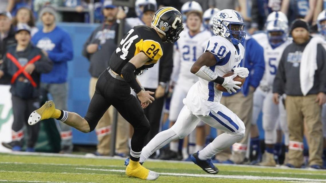 Franklin-Simpson’s Tre Bass runs 73 yards for a touchdown against Johnson Central in the Class 4A Russell Athletics KHSAA Commonwealth Gridiron Bowl at Kroger Field in Lexington, Ky., Saturday, December 2, 2017.