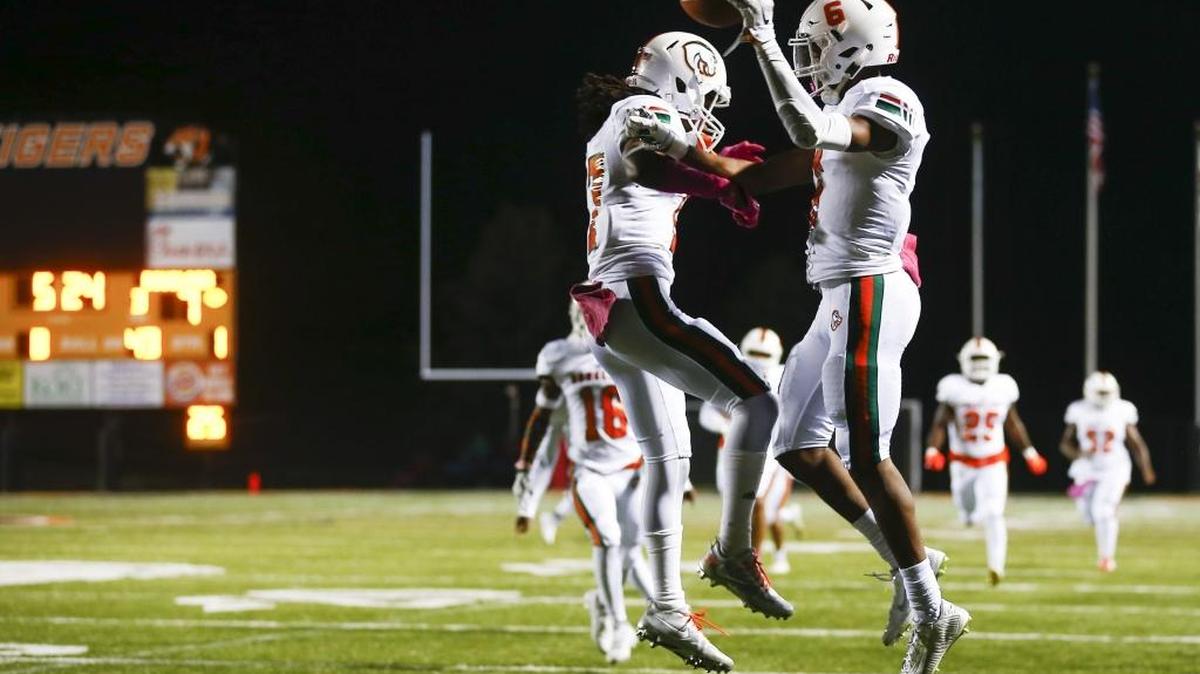 Frederick Douglass' Micah Lowe (17) and Frederick Douglass' Maliq Trigg (6) celebrates a touchdown during their game against Scott County at Toyota Stadium in Georgetown, Ky., Friday, Oct. 6, 2017. Scott County beat Frederick Douglass 55-21.