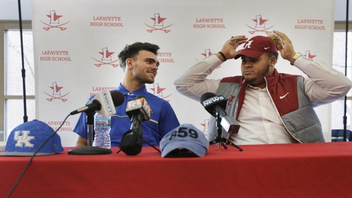 Walker Wood, left and Jedrick Wills announced their commitments after school on football signing day at Lafayette High School in Lexington, Ky., on Feb. 1, 2017.