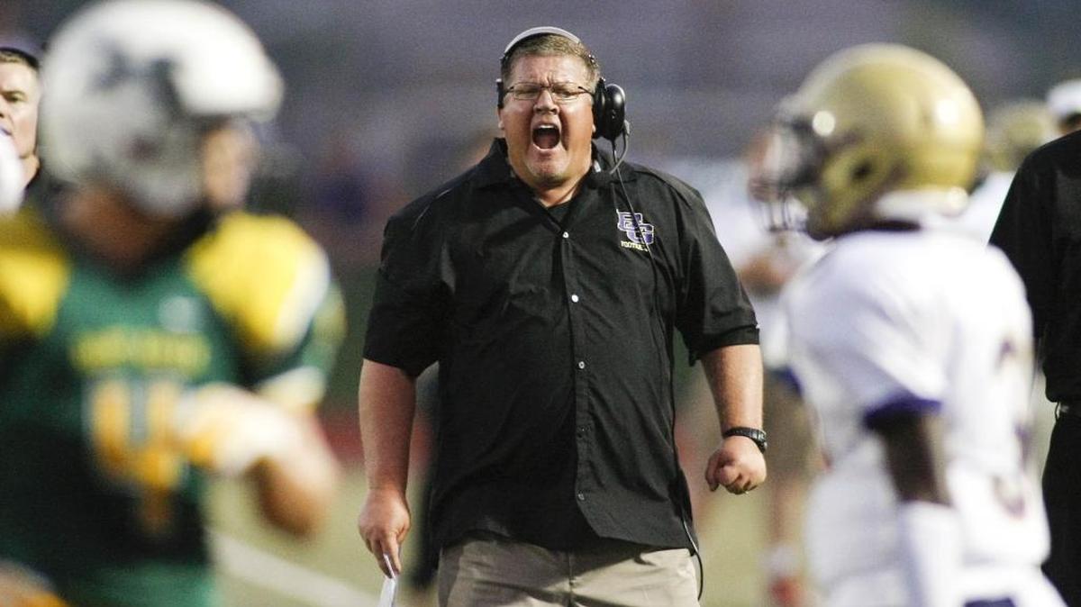 Bowling Green head coach Kevin Wallace yells down field during their game against St. Xavier at St. Xavier High School, Friday, Sept. 6, 2013, in Louisville, Ky.