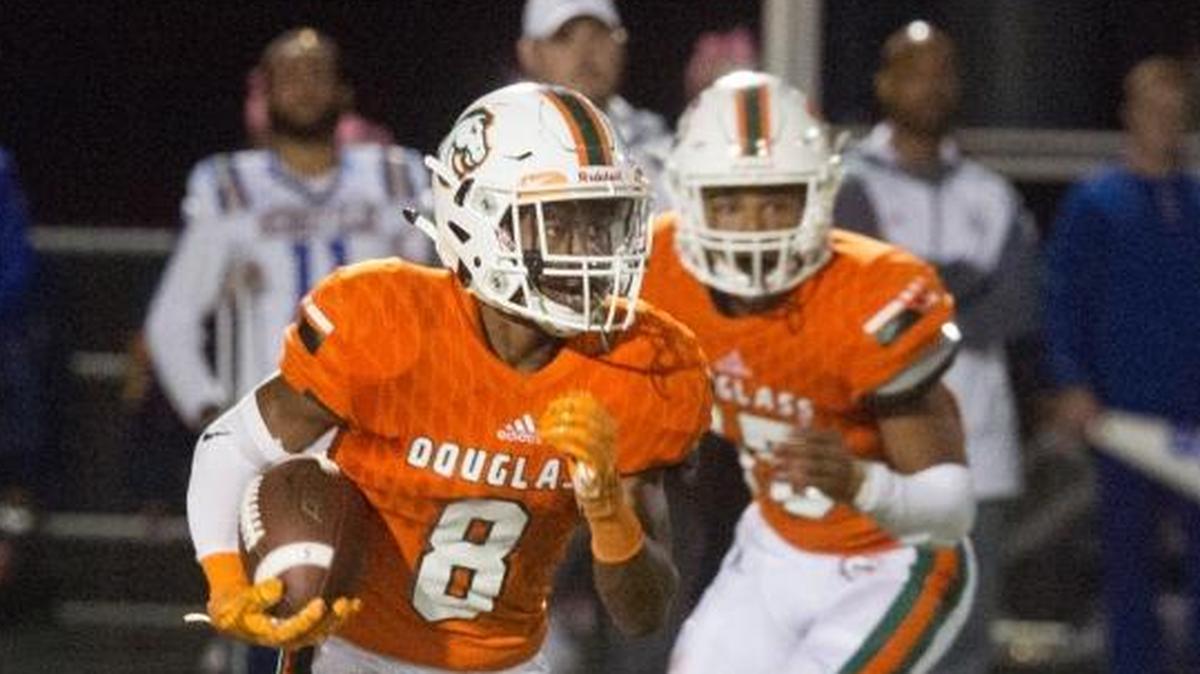 Frederick Douglass’ Haiden Hunt made one of his six catches in the Broncos’ 14-7 win over Henry Clay on Friday. He caught a 40-yard touchdown pass from Montaveon Bean with just over a minute left in the game to seal the win and give the Broncos a sweep over Lexington’s other four public high schools.