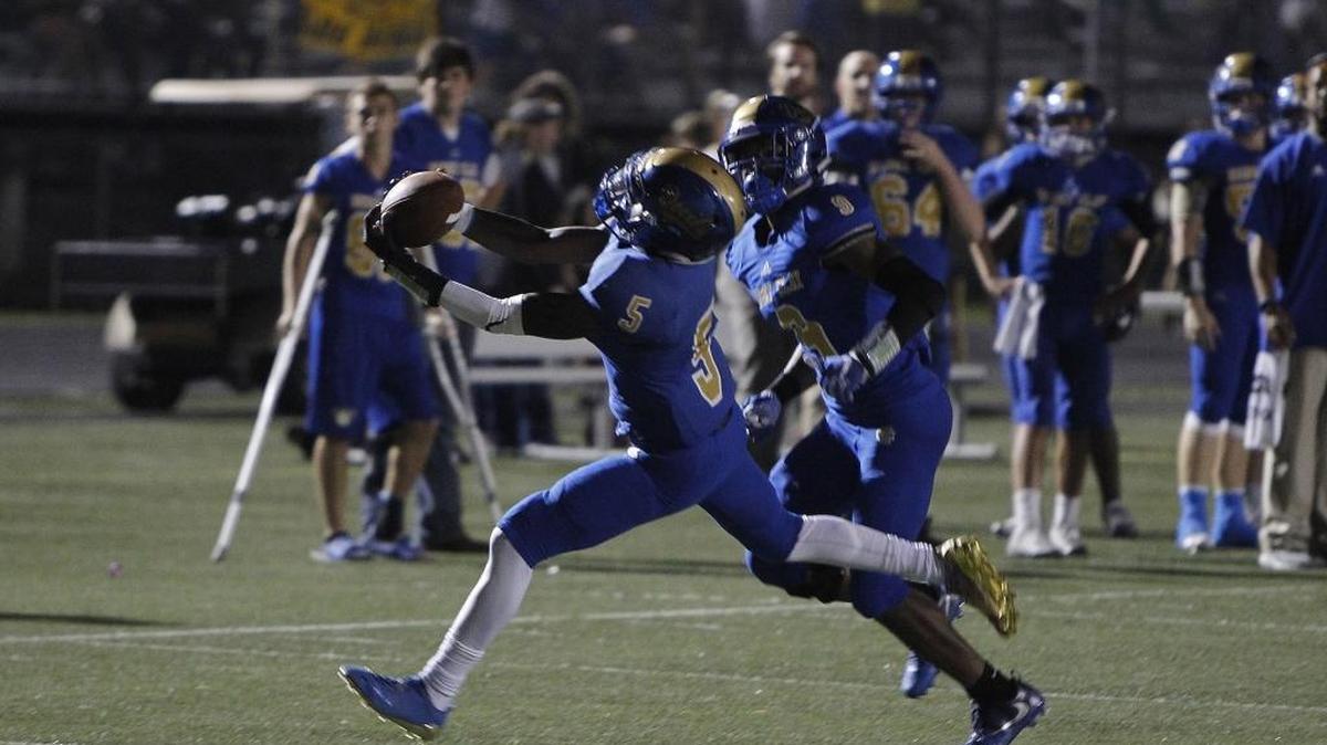 Henry Clay's Ramond Jackson breaks up the pass against Lafayette at Henry Clay High School in Lexington, Ky., Friday, September 22, 2017.