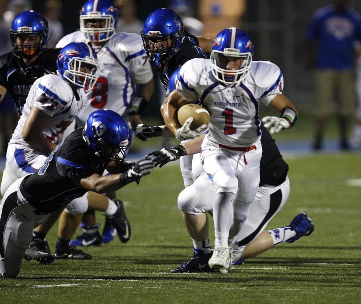 Madison Central's Ethan Hahn runs against Lexington Catholic in Lexington, Ky., Friday, September 16, 2016.