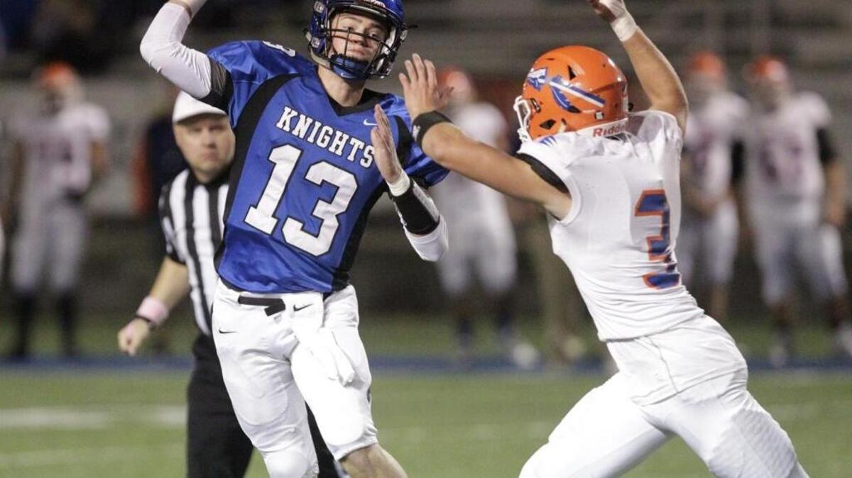 Southwestern’s Treavor Brock (3) pressured Lexington Catholic quarterback Kirk Fagot in the backfield. Lexington Catholic hosted Southwestern on Friday, October 28, 2016.