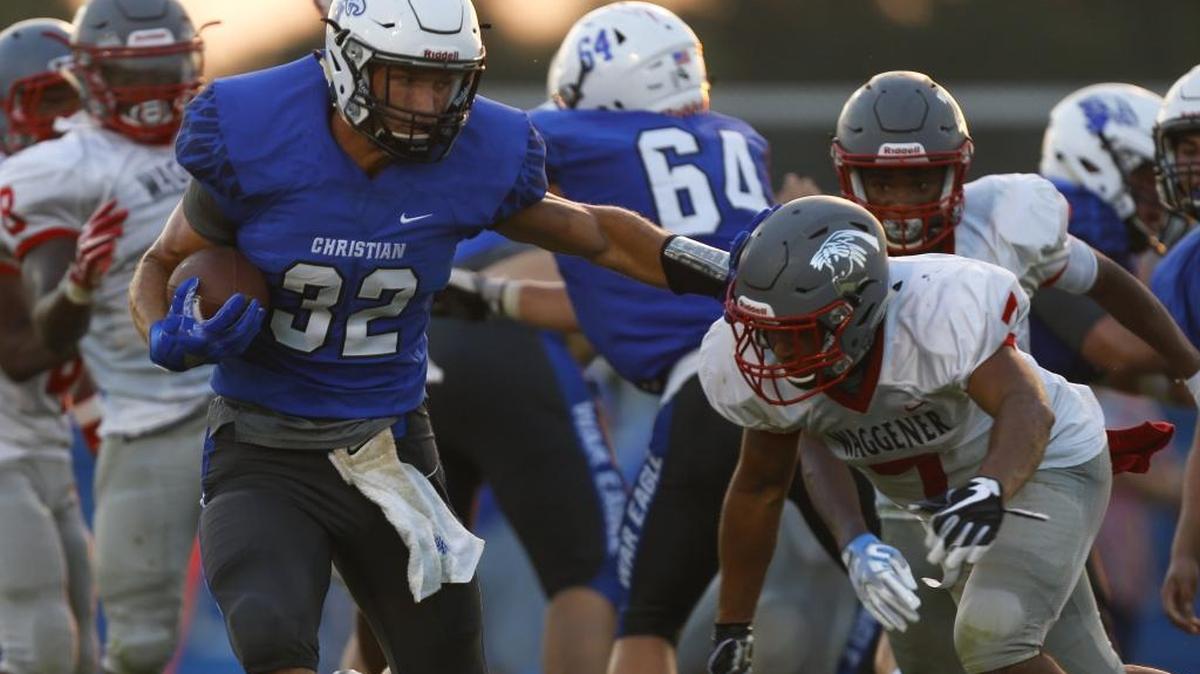 Lexington Christian running back Dillion Wheatley avoids a tackle against Waggener at Lexington Christian Academy in Lexington, KY., on Saturday, August 19, 2017.