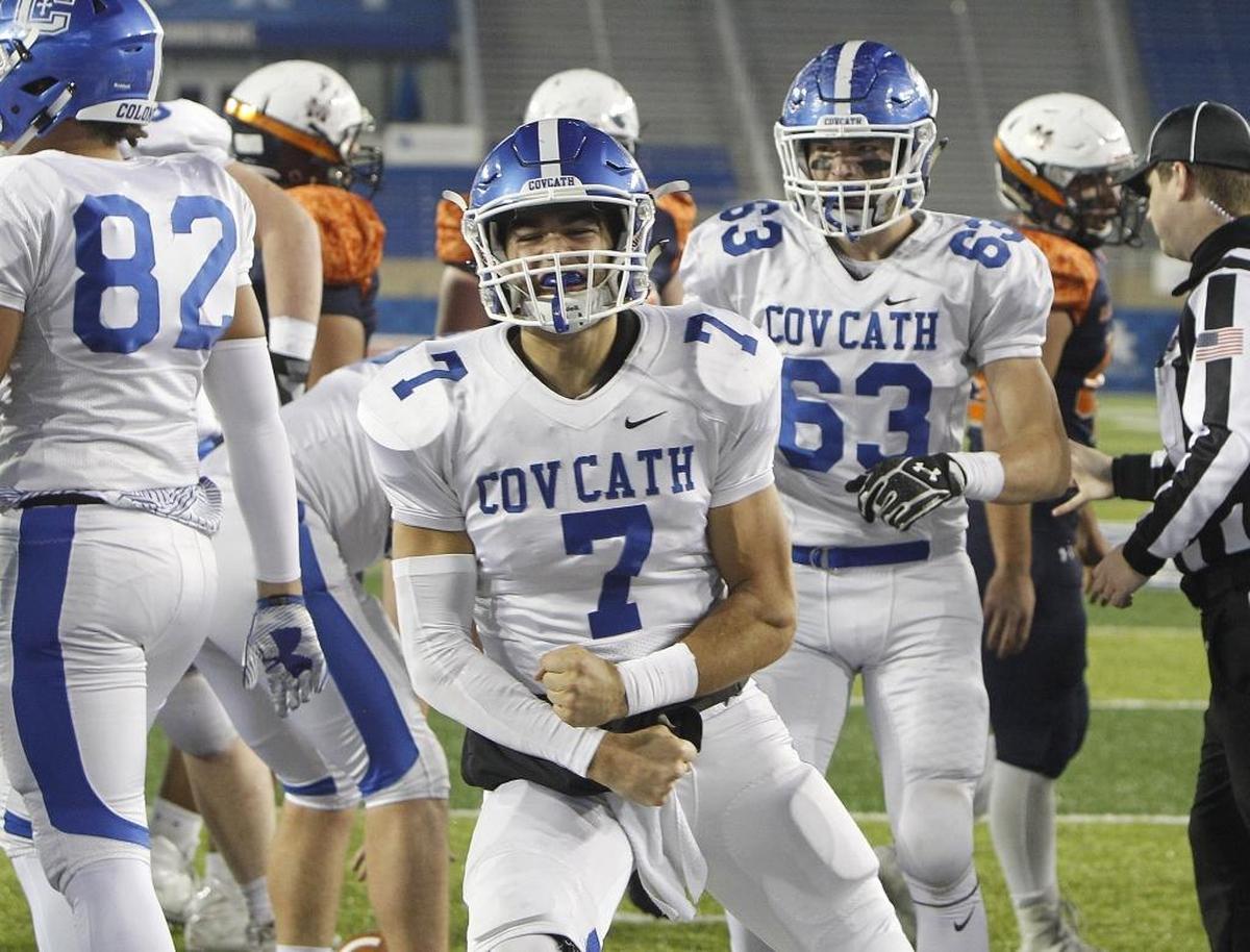 Covington Catholic's A. J. Mayer reacts after his touchdown run against Madison Southern in the Class 5A Russell Athletics KHSAA Commonwealth Gridiron Bowl at Kroger Field in Lexington, Ky., Saturday, December 2, 2017.