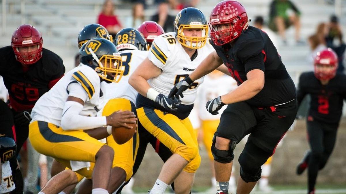 Bryan Hudson, 71 of Scott County, chases down Miles Mcbride, 2 of Archbishop Moeller during the game at Toyota Stadium in Georgetown, Kentucky on September 8, 2017.