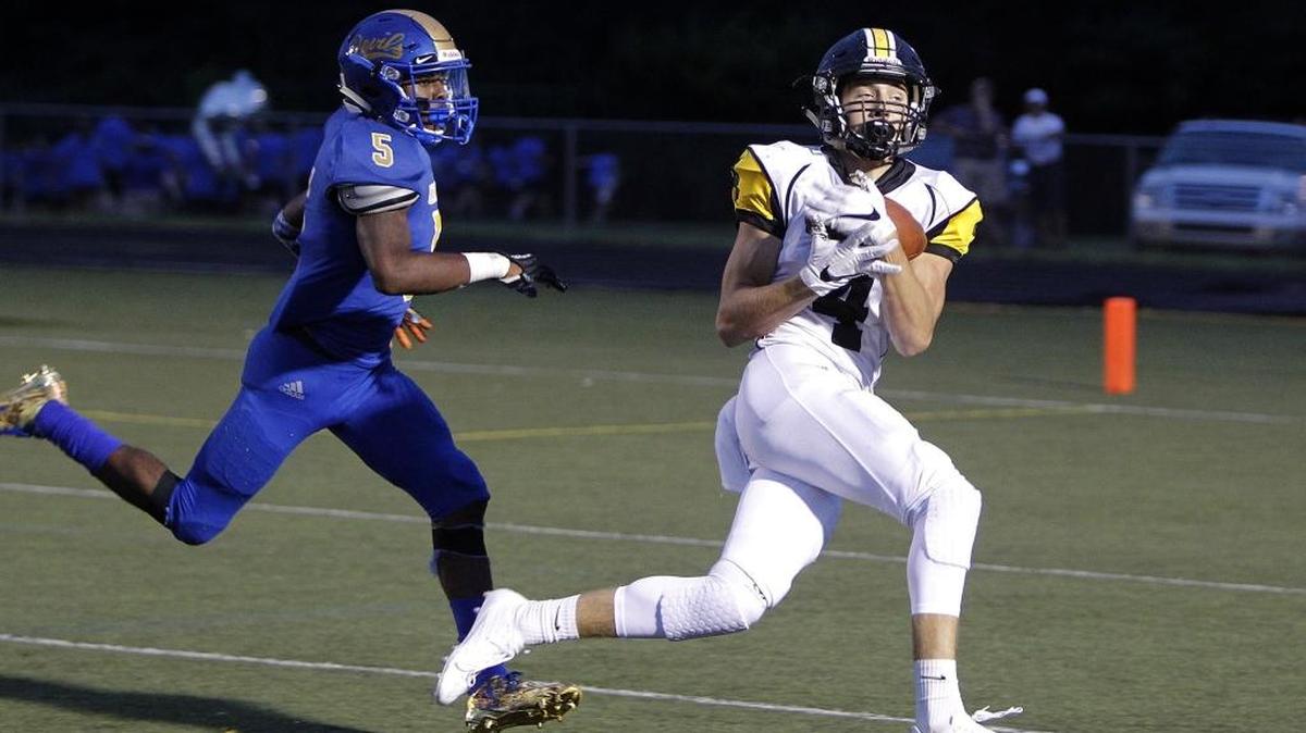 Johnson Central's Seth Dalton makes a 42-yard reception on the 1-yard line setting up a touchdown on the next play against Henry Clay at Henry Clay in Lexington, Ky., Thursday, August 31, 2017.