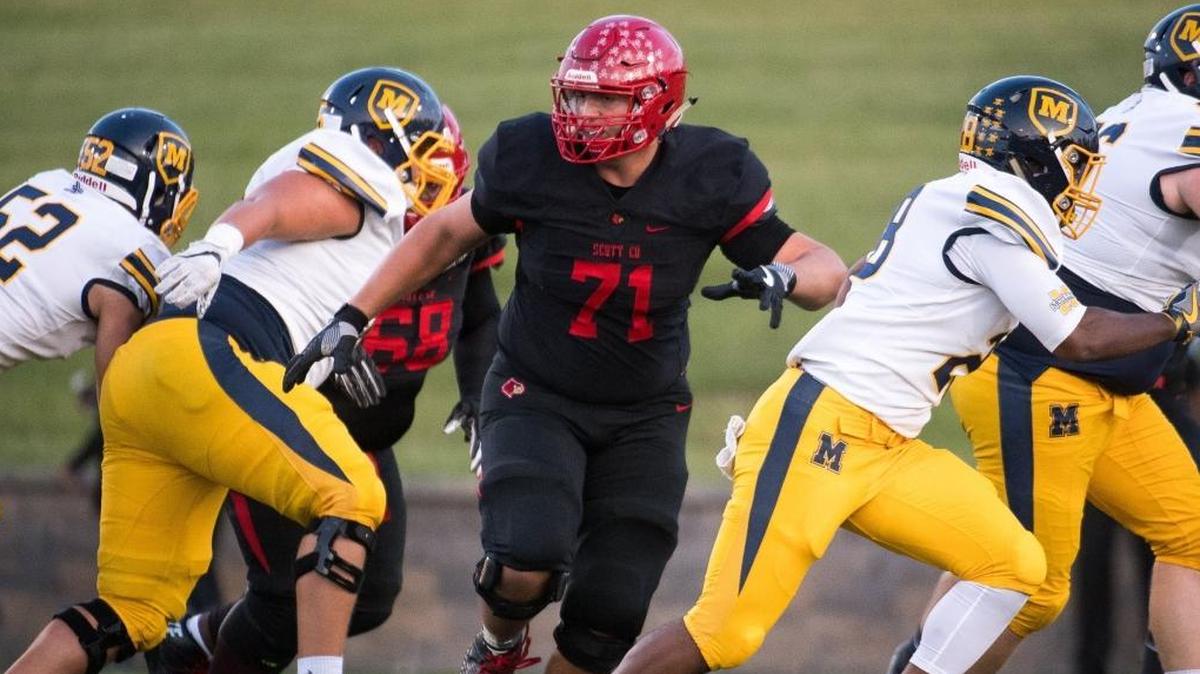 Bryan Hudson, 71, of Scott County attempts to make a tackle during the game against Archbishop Moeller at Toyota Stadium in Georgetown, Kentucky on September 8, 2017.