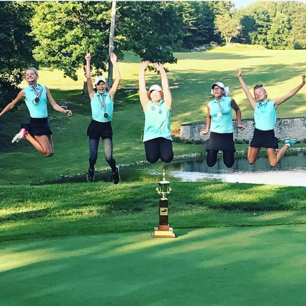 Members of the Lexington Christian Academy girls’ golf team celebrated after winning the program’s first All “A” Classic state golf tournament at Woodson Bend Resort in Bronston, Ky., on Saturday, Sept. 9