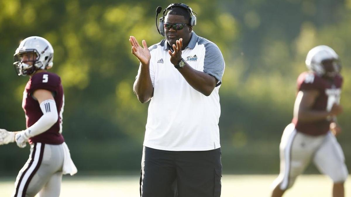 Tates Creek head coach Antoine Sims celebrates after a touchdown in the second quarter of their game against Henry Clay during the Adidas Kickoff Classic at Tates Creek High School, Friday, Aug. 18. 2017.