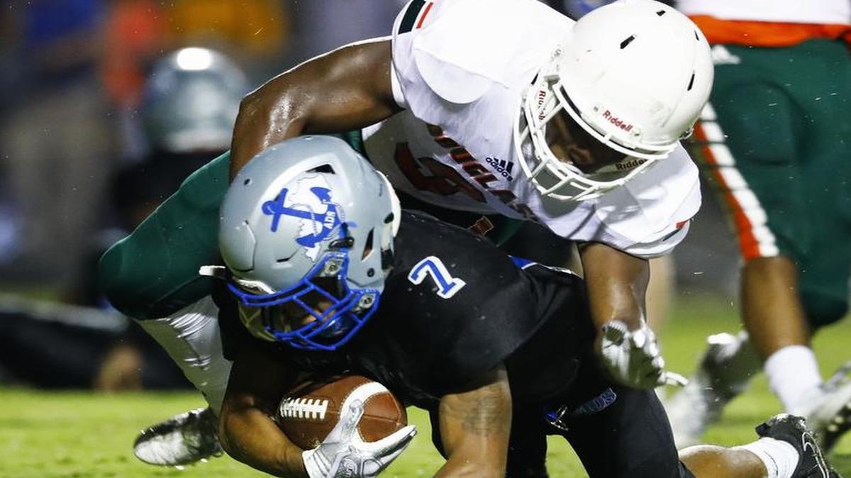 Danville's Dmauriae VanCleave (7) scored during the second game of the Bob Allen Pigskin Classic on Saturday night.