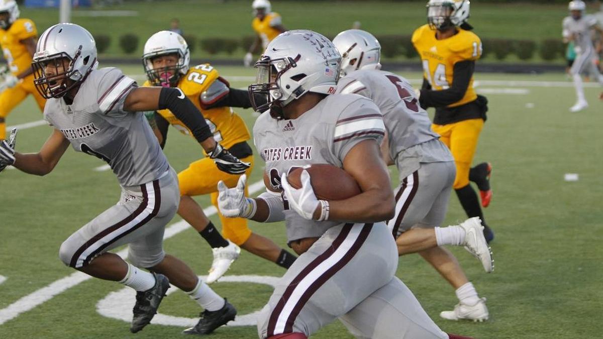 Tates Creek's Teonte White runs against Bryan Station at Tates Creek in Lexington, Ky., Friday, September 15, 2017.