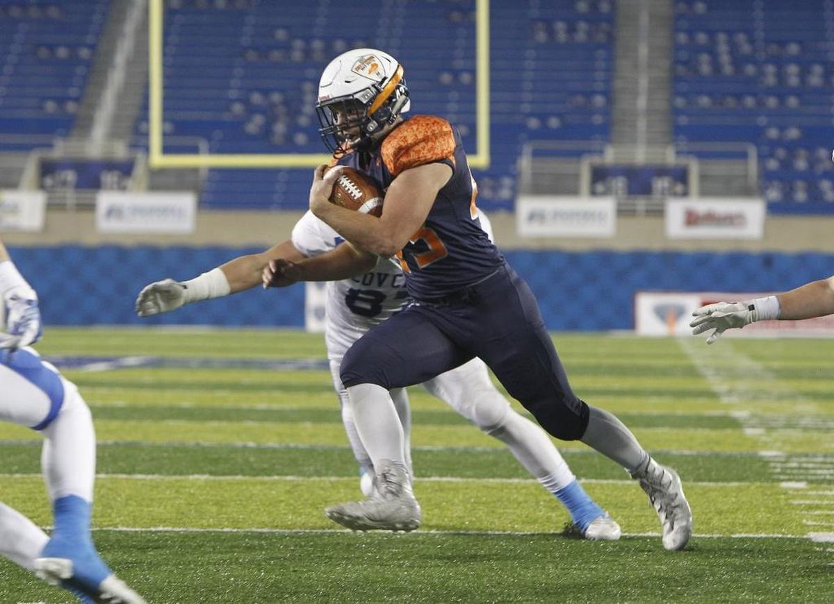 Madison Southern's Carter Smith runs against Covington Catholic in the Class 5A Russell Athletics KHSAA Commonwealth Gridiron Bowl at Kroger Field in Lexington, Ky., Saturday, December 2, 2017.