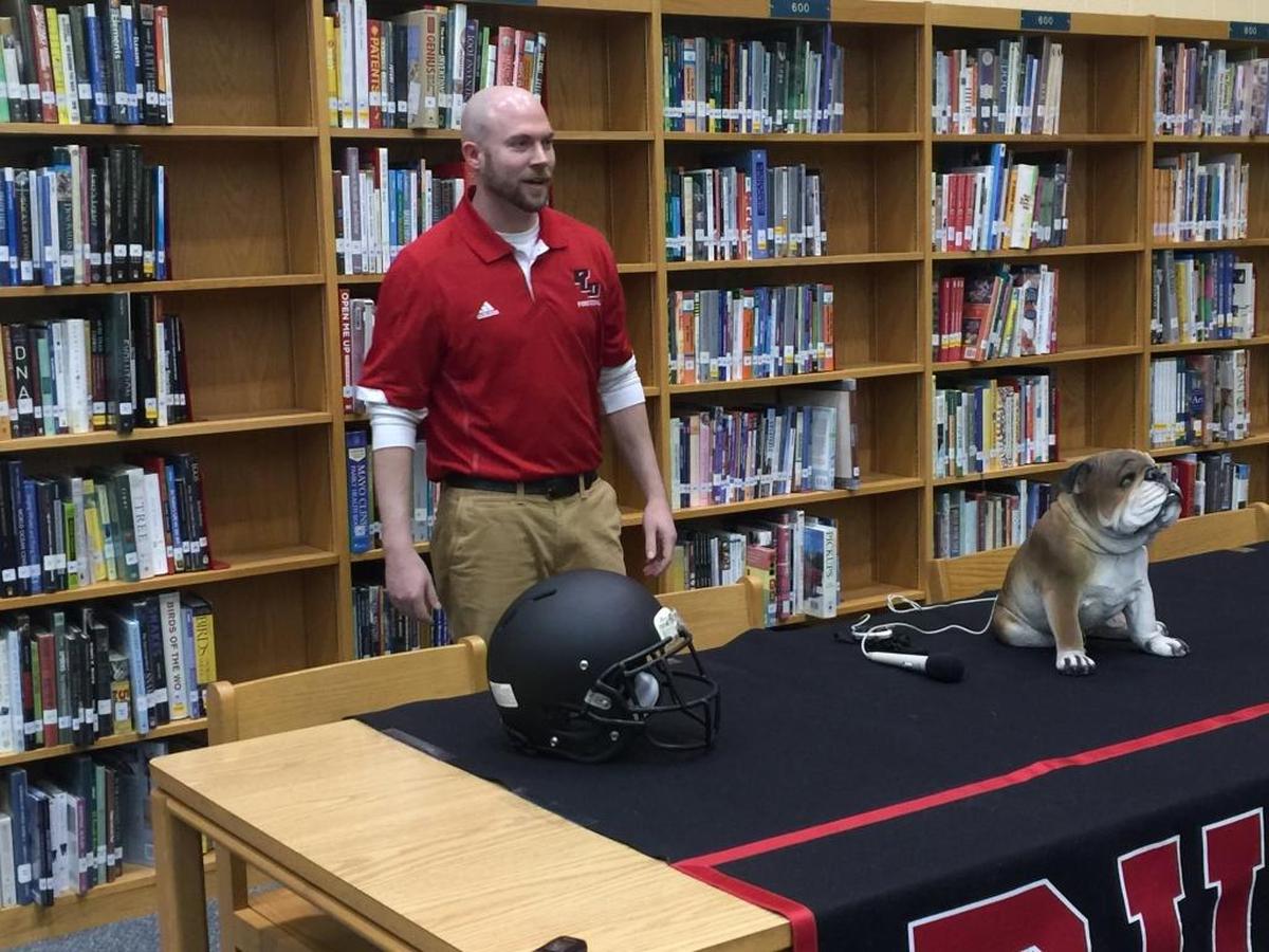 Chris Mullins was introduced as the new football coach at Paul Laurence Dunbar High School on Monday, Feb. 29, 2016. Less than two years later, he announced his resignation.